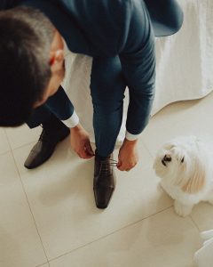 Man Lacing Up His Shoes
